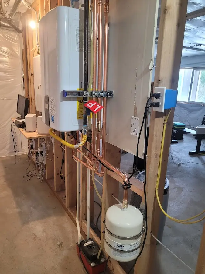 Licensed plumber repairing a kitchen sink in Navy